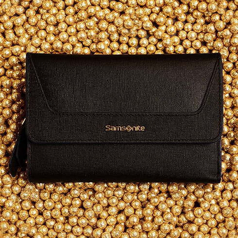 Our Satiny shoulder bag steals the spotlight.